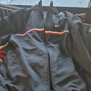 Nike Black Windbreaker Jacket Modern Athletic Design